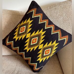 Native American hand woven in a loom diamond design .